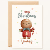 Christmas card with a gingerbread man design and 'Merry Christmas' text.